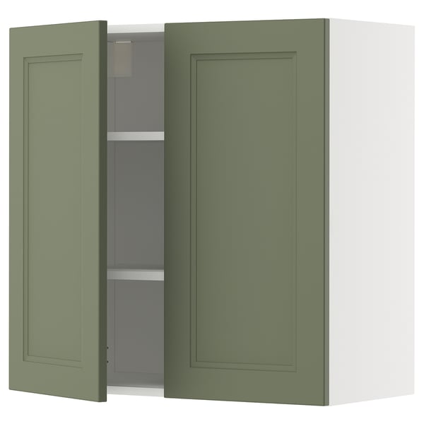 Green cabinets, modern kitchen design, wall-mounted, with adjustable shelves, and a sleek handle-less front.