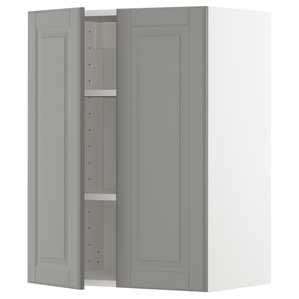 A grey METOD kitchen wall cabinet with a rectangular shape and beveled edges, featuring a single adjustable shelf inside.