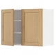 The METOD kitchen wall cabinet with light oak doors. It has a framed design with beveled edges. One door is open, revealing inner shelves.