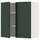 A green kitchen cabinet with one door open, revealing adjustable shelves inside.