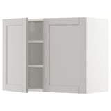 White METOD kitchen cabinet with beveled edges and inner shelves.