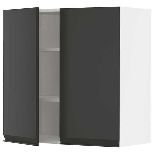 A modern black wall cabinet from the METOD kitchen system, with a sleek matte finish and integrated handles.