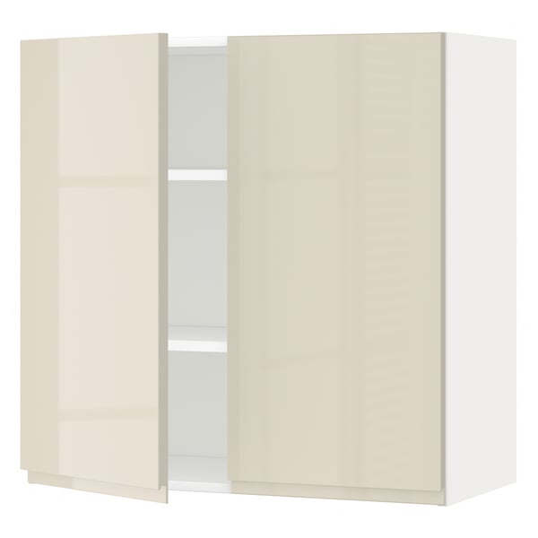 A METOD kitchen wall cabinet in high gloss beige with two doors and an adjustable shelf.