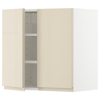 Beige kitchen cabinet with high gloss finish, two doors open, shelves inside.