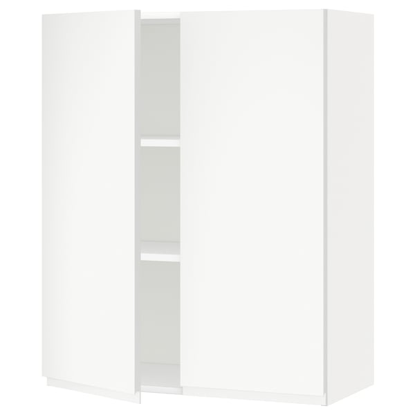 A white METOD kitchen cabinet with a minimalist design and adjustable shelves.