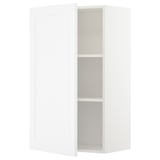 A white METOD kitchen cabinet with a door and adjustable shelf. Its rectangular and a simple, modern design.