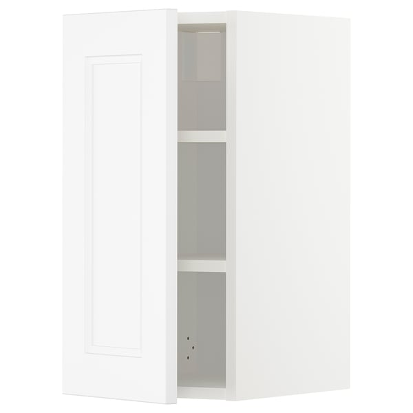 White METOD kitchen unit with adjustable shelves, featuring a single paneled door.