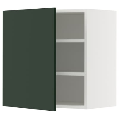 Open white wall cabinet with adjustable shelves, green door.