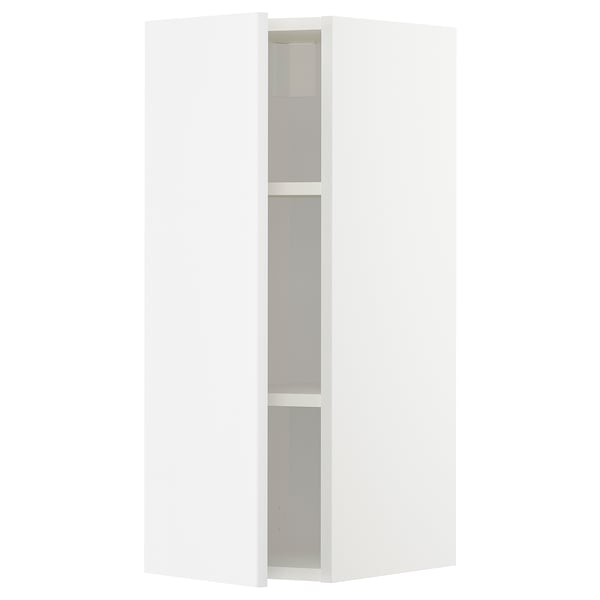 A tall, narrow, white corner cabinet for kitchen storage with internal shelves.
