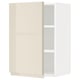 METOD wall cabinet in high gloss beige with adjustable shelf.