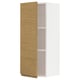 Ikea METOD white cabinet with oak door open.