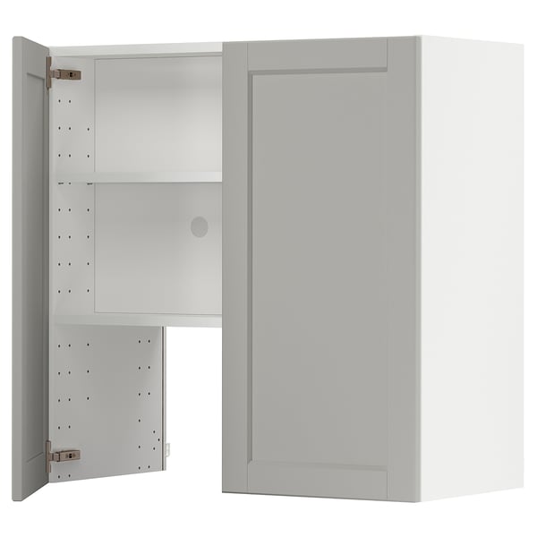 Image shows white METOD kitchen cabinet with light grey lerhyttan doors, featuring beveled edges and adjustable shelves.