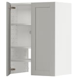 A white METOD kitchen cabinet with adjustable shelves and a reversible door, featuring a classic design with beveled edges.