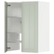 A METOD kitchen cabinet with a green stensund door, featuring adjustable shelves and a modern design.