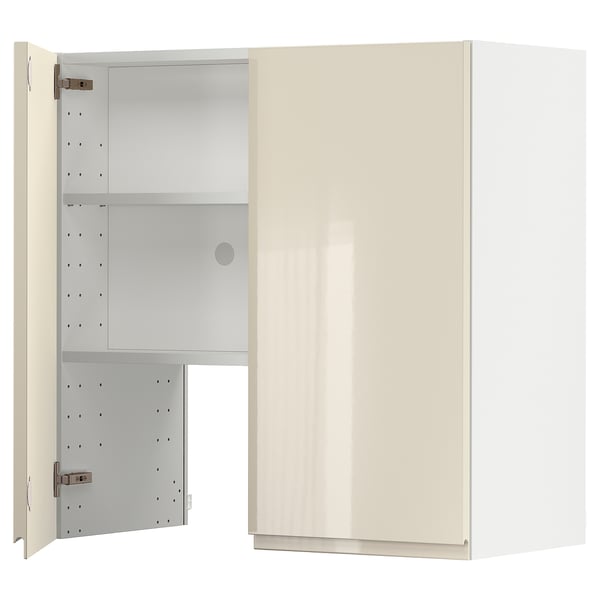 A cream-colored, high-gloss METOD kitchen cabinet with an adjustable shelf and a door mounted on the left side.