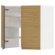 A METOD kitchen unit with oak-style doors and white interior shelving.