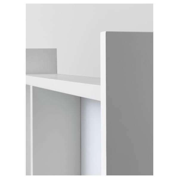 White desk with adjustable shelves for books & storage.