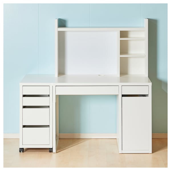 White MICKE desk with storage units, shelves, and a notice board. Clean, modern design for study or hobby.