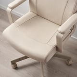 Beige home office chair, upholstered fabric, padded armrests, adjustable height, backrest, and tilt tension.