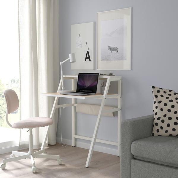 The MITTPLAN desk in white & birch fits small spaces; modern, sturdy design with a laptop and chair.