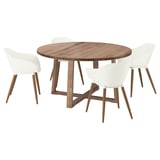 A round, wood-top dining table with a rustic finish and four matching white, cushioned chairs. The table has a modern, cross-legged design.