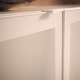 Close-up of a white MÖRTVIKEN mesh cabinet door. Modern metal design with small hole patterns.