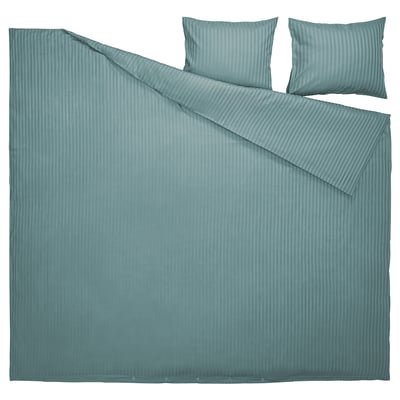 A NATTJASMIN duvet cover set in teal with subtle stripes, made from cotton and lyocell for a lustrous, soft finish.
