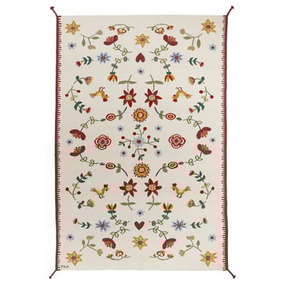 Nickgras rug, cream with red, yellow, blue flower designs, wool, cotton, braided corners.