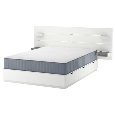 Modern white bed with grey mattress, headboard, and storage; sleek design.