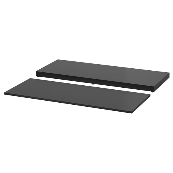 Two black rectangular shelf tops, laid separately, modern design for NORDLI storage system.