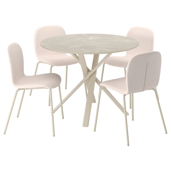 NORRMJÖLE dining set: round beige table, white top, metal legs. Four pastel pink fabric chairs with metal legs and curved backs.
