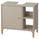 A beige NORSÄLVEN bathroom cabinet with a door and open shelves, made of particle board, featuring clean lines and wooden legs.