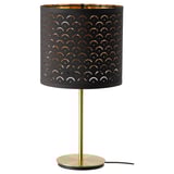 NYMÖ lamp, gold and black. Perforated shade casts light pattern. Round base, sleek design.