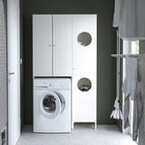 Small space laundry with white NYSJÖN storage cabinet and washing machine. Mounted above washer, saving floor space. Cabinet conceals dirty clothes.