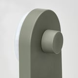 A sleek, modern wall organizer with a smooth, grey-green finish and rounded edges. It uses concealed suction cups for secure, drill-free mounting.