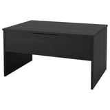 An ÖSTAVALL adjustable coffee table in black, featuring a sleek, rectangular design with minimalistic aesthetics, suitable for modern living rooms.