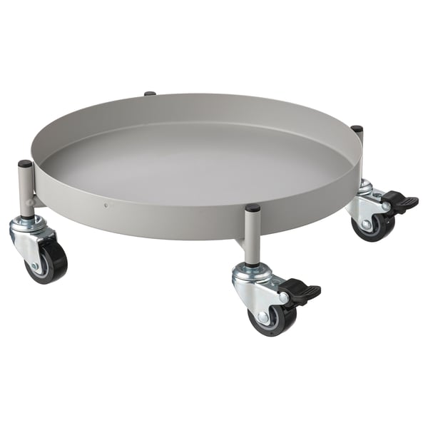 A gray OLIVBLAD plant mover with four wheels, designed for easy movement of plants, featuring brakes and reversible tray.