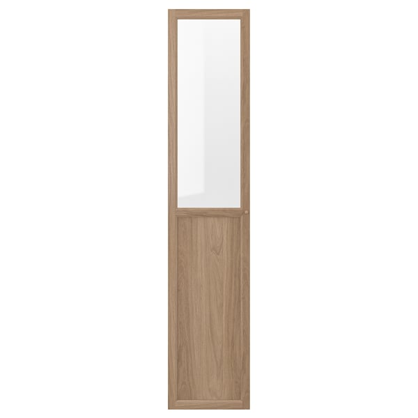 An OXBERG door in oak tone for billy bookcase, featuring a combination of glass and wooden panels.