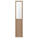 An OXBERG door in oak tone for billy bookcase, featuring a combination of glass and wooden panels.