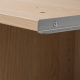 A wooden unit with an adjustable metal foot ensuring stability and an elegant finish.