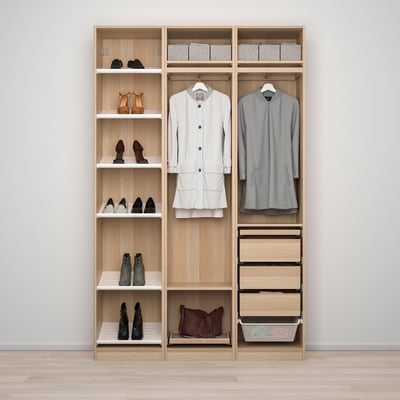 A wooden wardrobe with shelves displaying shoes, hanging clothes, and drawers, showcasing organized storage options.
