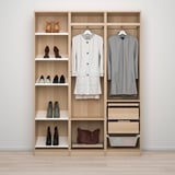 Organized closet with hanging clothes, shelves for shoes, and drawers.