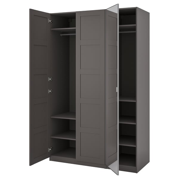 An open gray ikea PAX wardrobe with shelves and hangers inside.