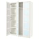 An open white PAX wardrobe with mirrored and frosted glass doors, featuring multiple shelves inside.