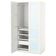 An open white PAX wardrobe with drawers and shelves.