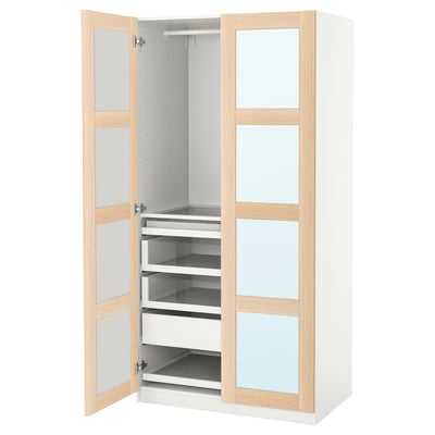 PAX wardrobe: white & wood, glass doors, open showing shelves.