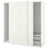 A white ikea PAX wardrobe with sliding doors and mesh drawers.