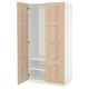An open light wood ikea PAX wardrobe with white interior and shelves.
