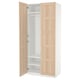 Option: An open wooden wardrobe named PAX with light oak doors and white interior.