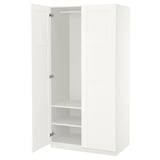 A white ikea PAX wardrobe with mirrored doors and empty interior shelves.